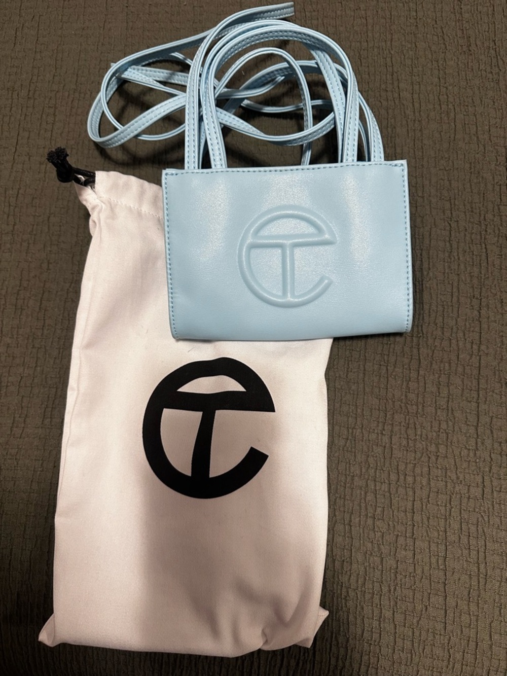 Telfar cross body mini in baby blue. Never worn.